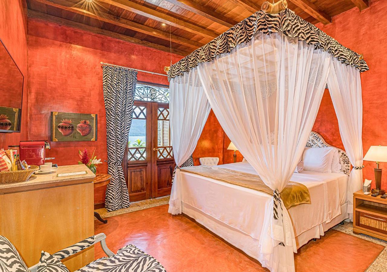 Dpny Beach Hotel & Spa Ilhabela Bagian luar foto A bedroom at the hotel