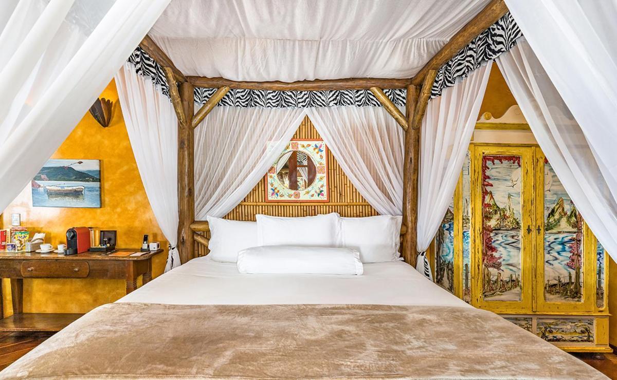 Dpny Beach Hotel & Spa Ilhabela Bagian luar foto A bedroom at the hotel